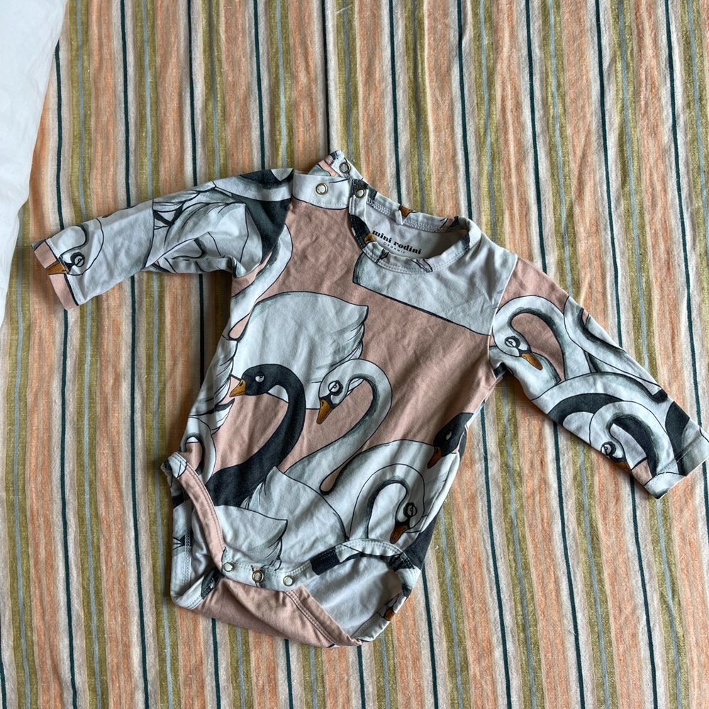 Mini Rodini swans onesie.